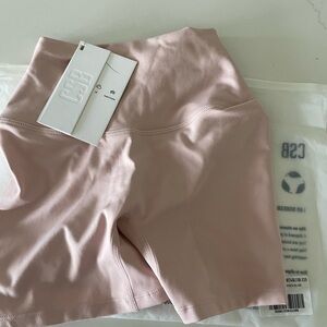 Crop Shop Boutique serenity scrunch shorts 4inches in color blush
